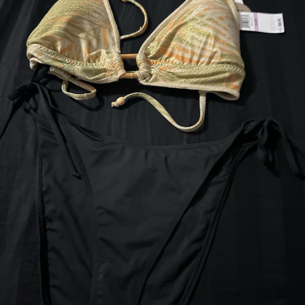 ****SEPARATE BRANDS***Stylish Black bottom is salt and cove and BECCA Gold TOP